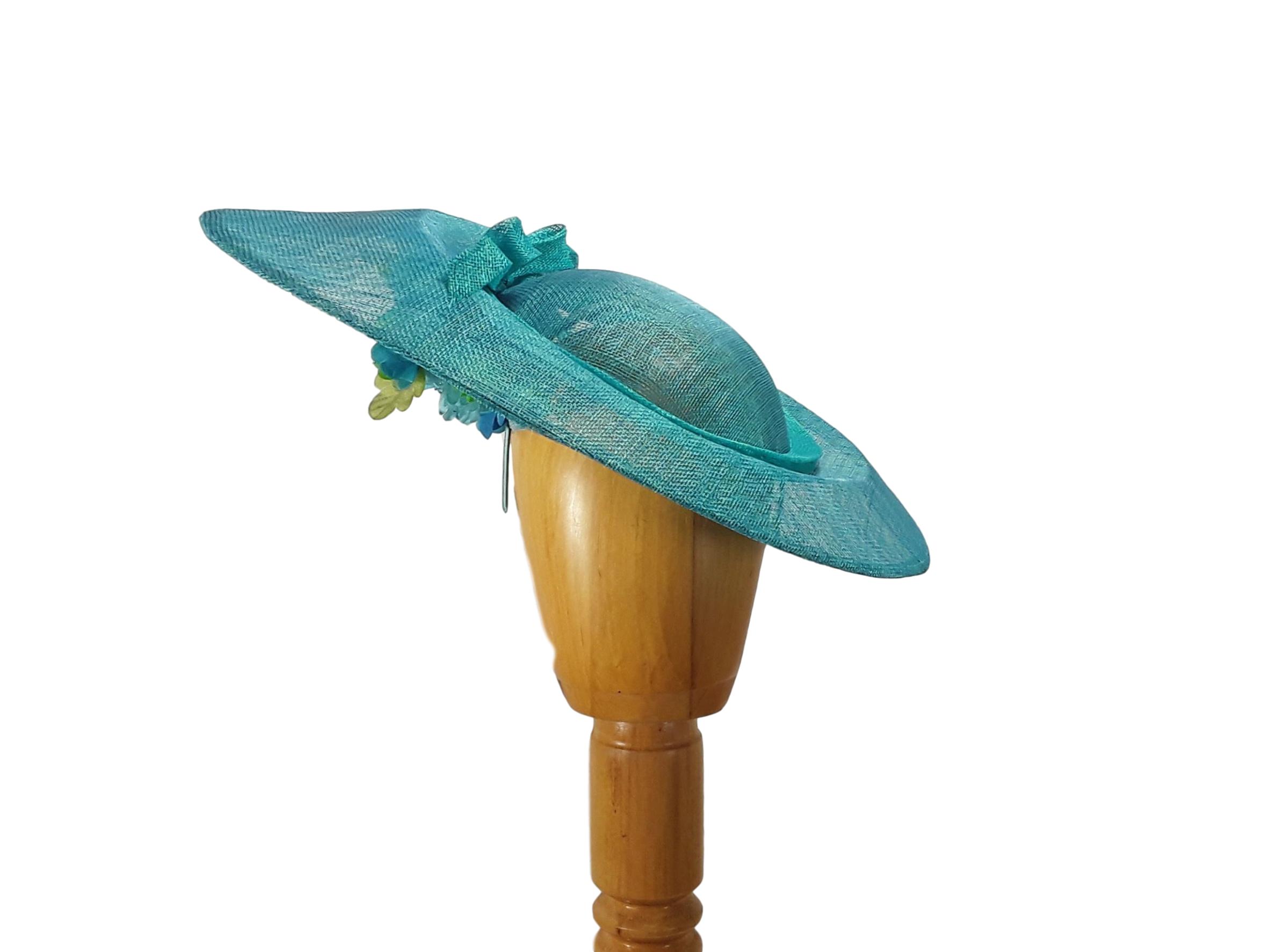 Teal pinokpok sinamay straw saucer hat with large teal and black windowpane  sinamay straw bow on headband